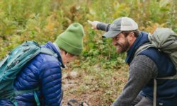 reading a map in the backcountry of alaska